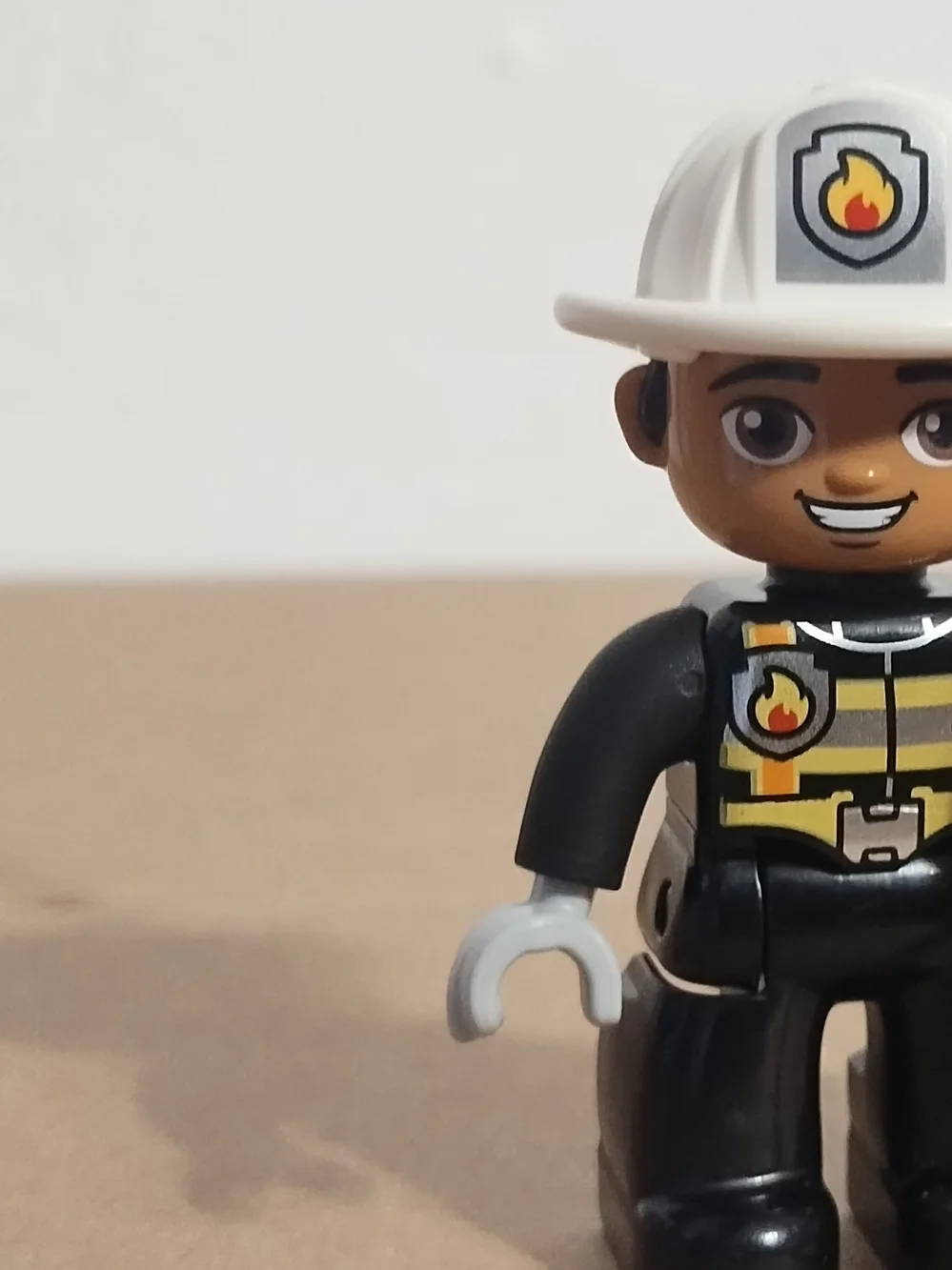 Lego Duplo Figure Fireman white hat (fire on hat) black uniform